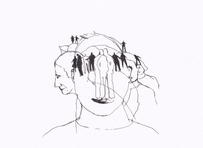 Eine Skizze, die ein menschliches Gesicht mit verschachtelten Silhouetten von Mensche – Schwarz-Tinte auf Papier