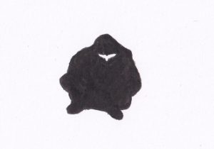 Person hockt auf dem Boden